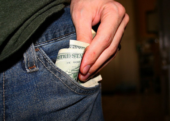 Flickr_bad_habits_pulling_money_out_of_pockets