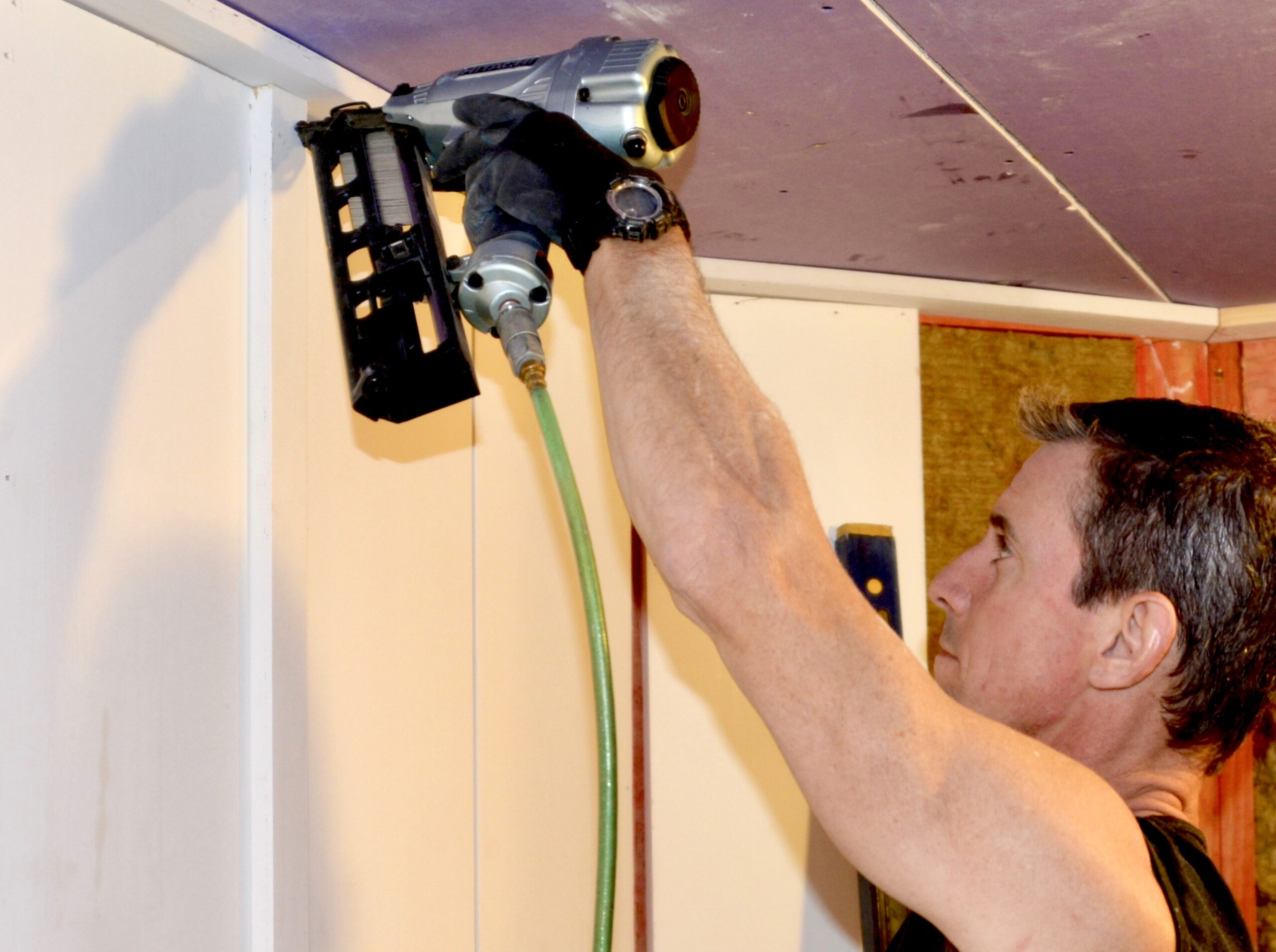 board and batten Mark Clement installs a batten in board and batten pattern wall