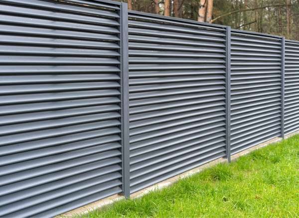 The Most Affordable Ways to Fence in a Yard: Corrugated Metal