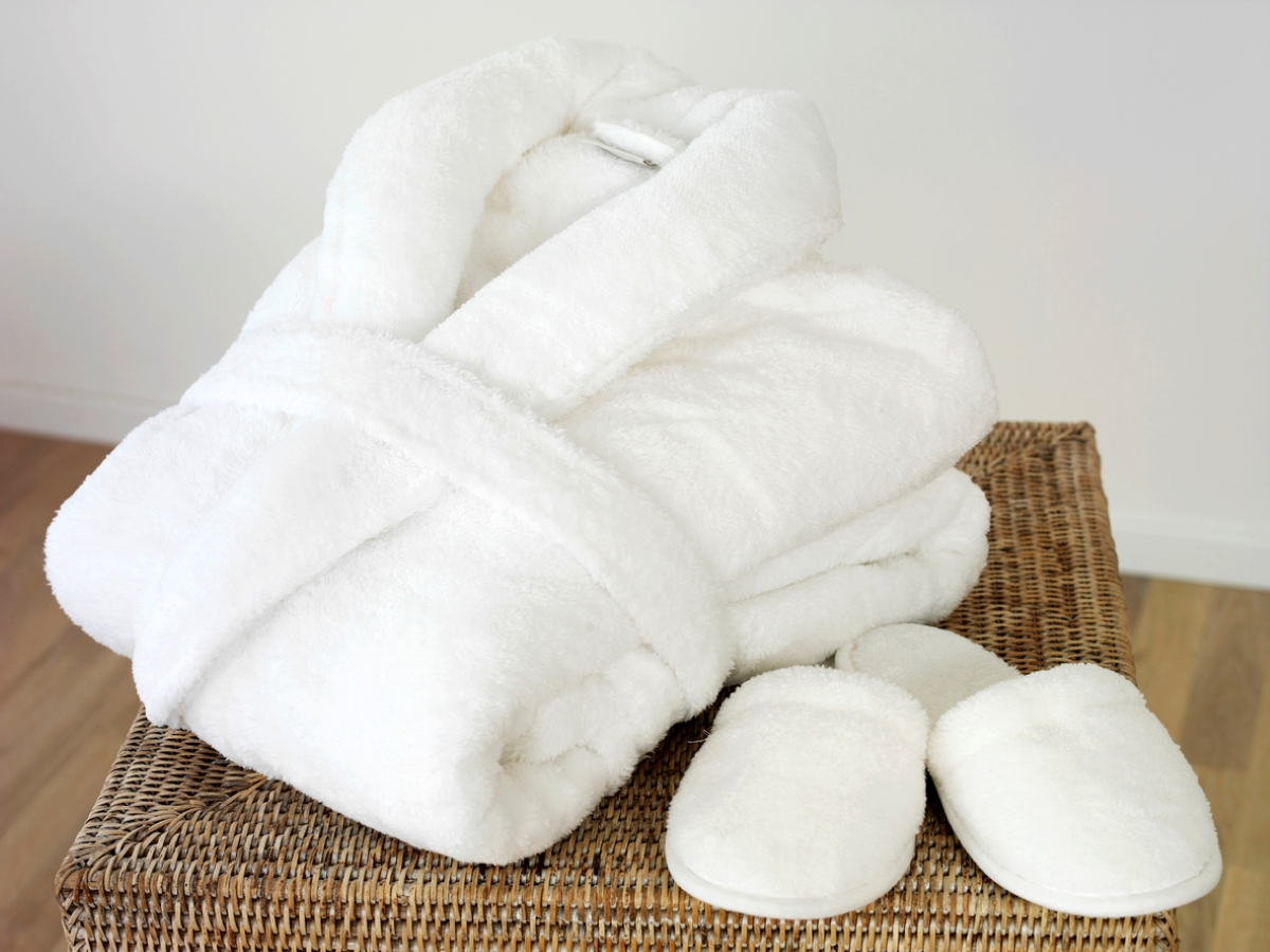how to become an Airbnb host - white robe and slippers