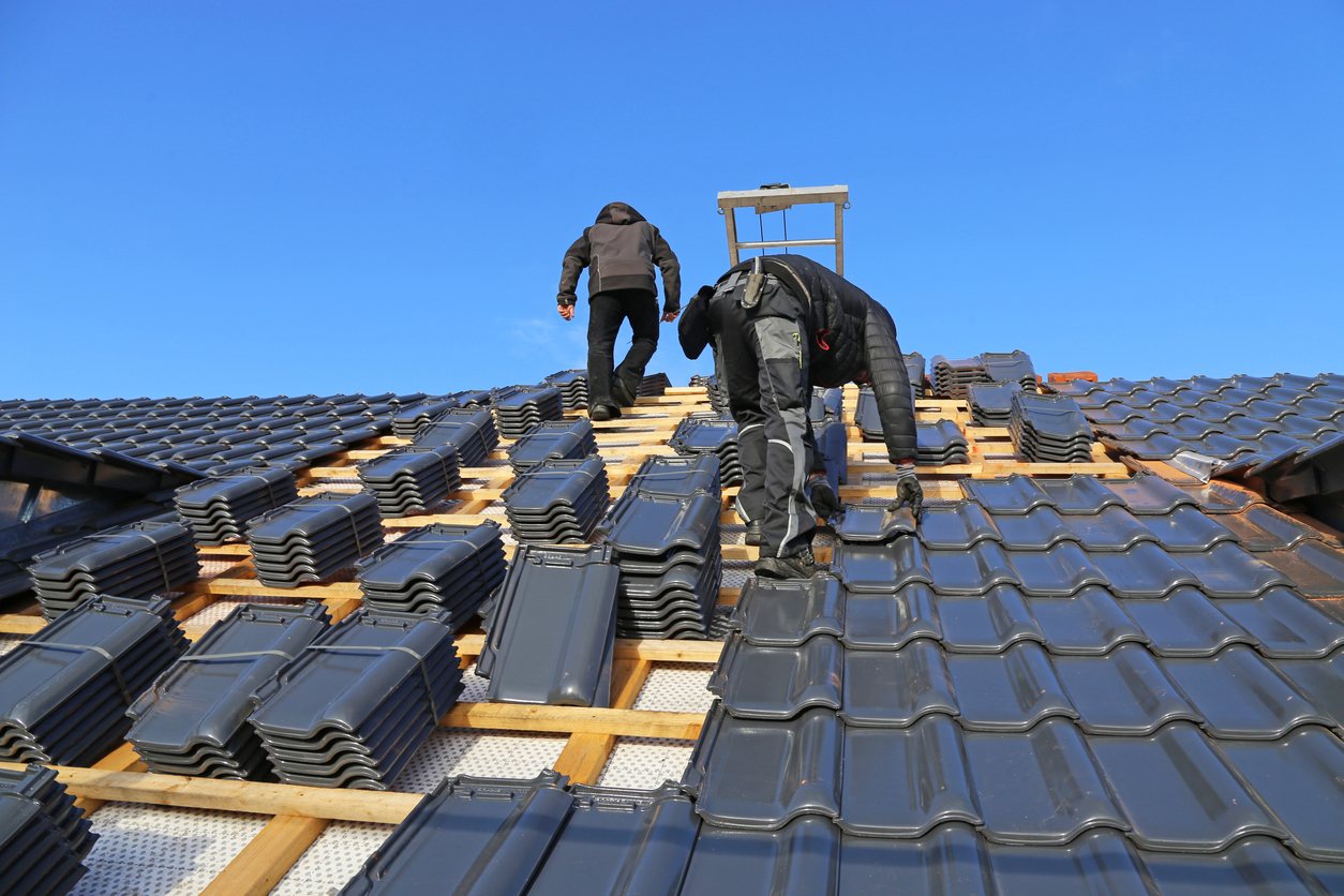 iStock-1187336633 rebates and tax credits installing metal roof.jpg