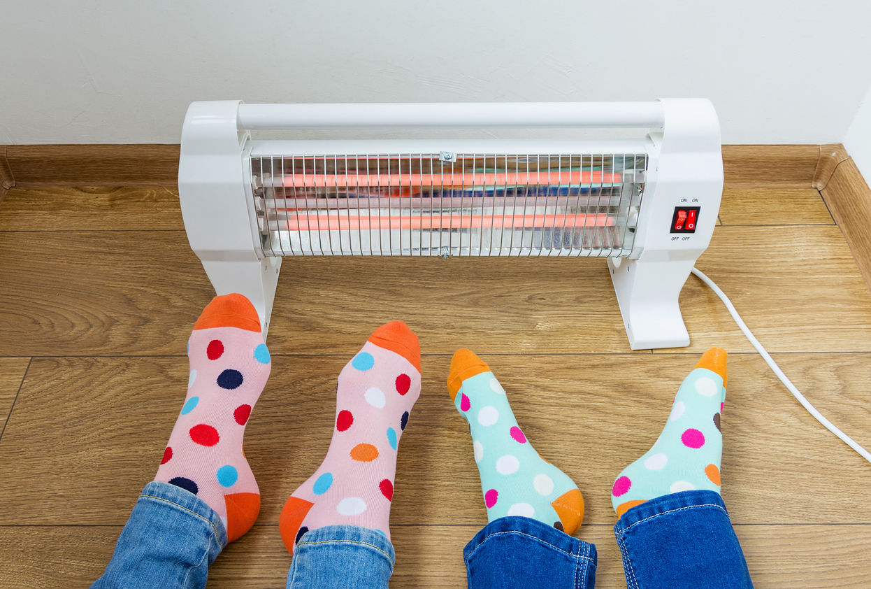 how much does it cost to run a space heater feet with colorful socks by infrared space heater