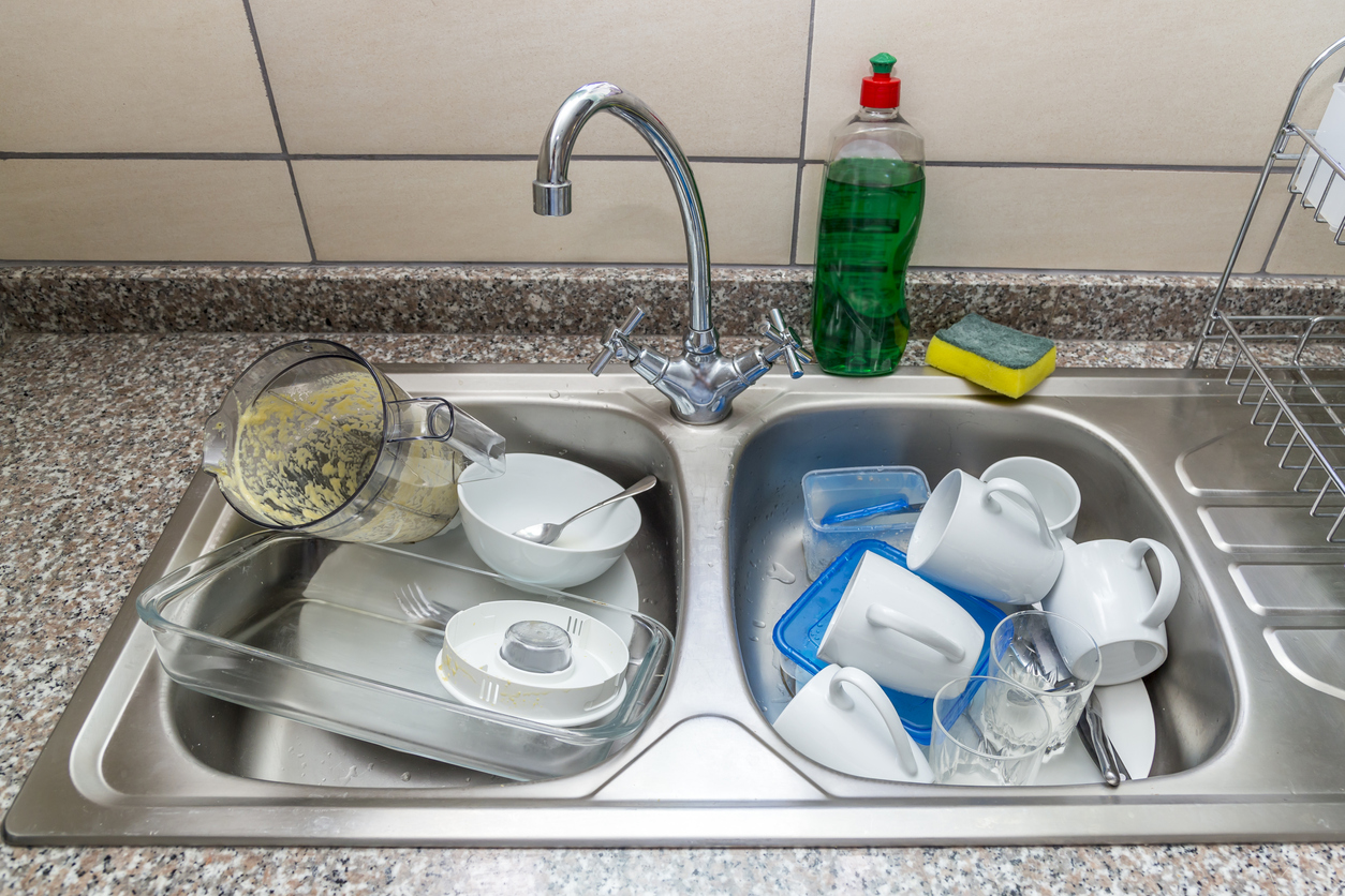 iStock-503538736 how to clean a blender dirty dishes in sink.jpg