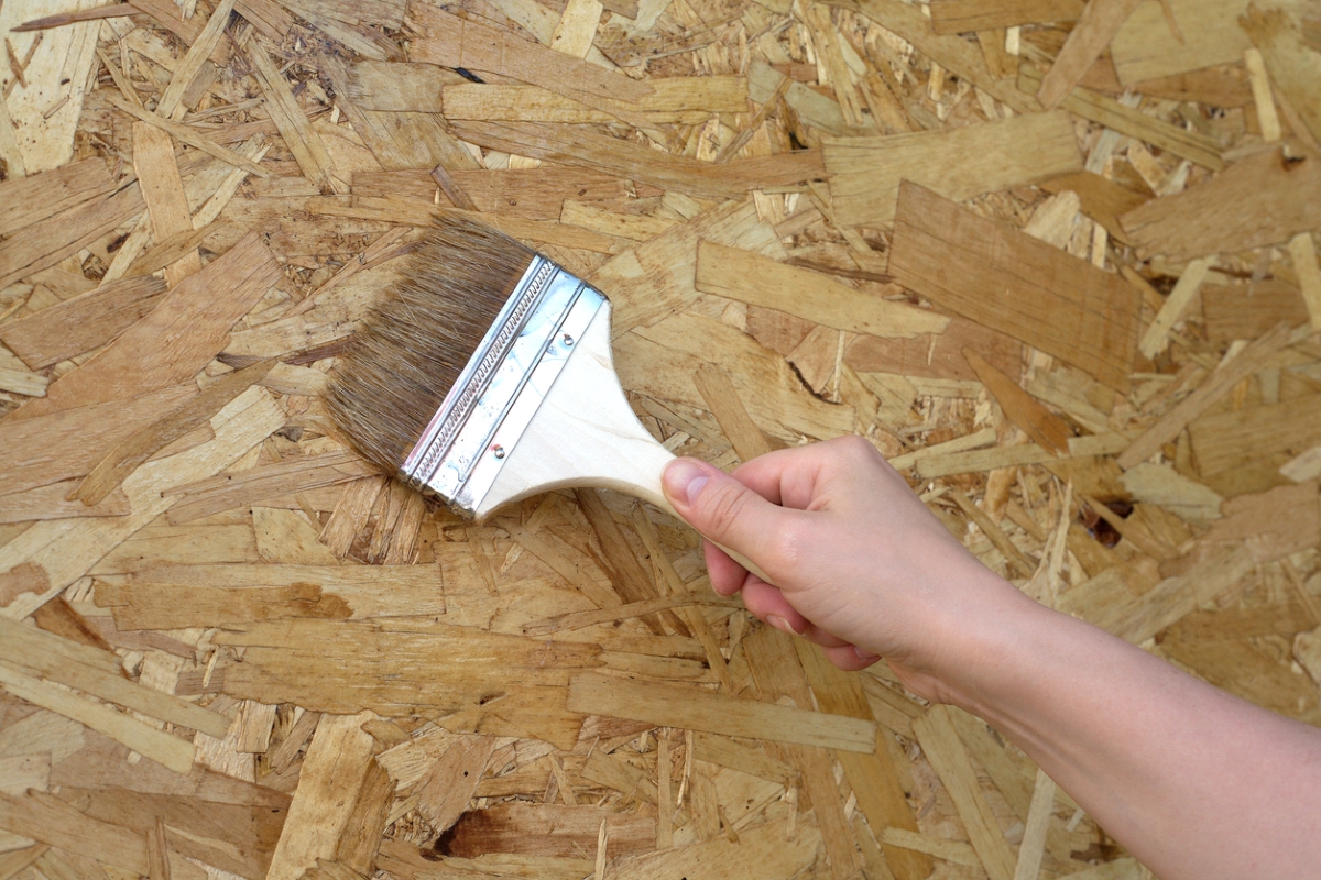 can you paint particle board - paint brush on particle board