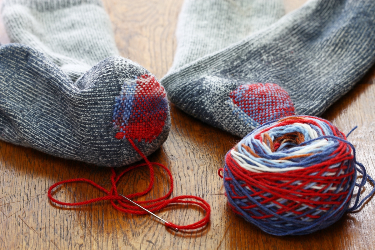 how to darn a sock - multi-color threaded sock patch