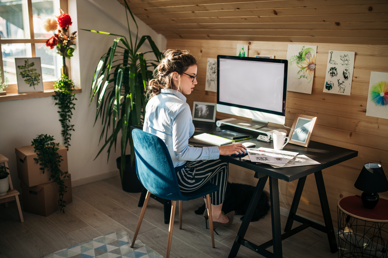 iStock-1136856372 ways to improve your life woman working in home office