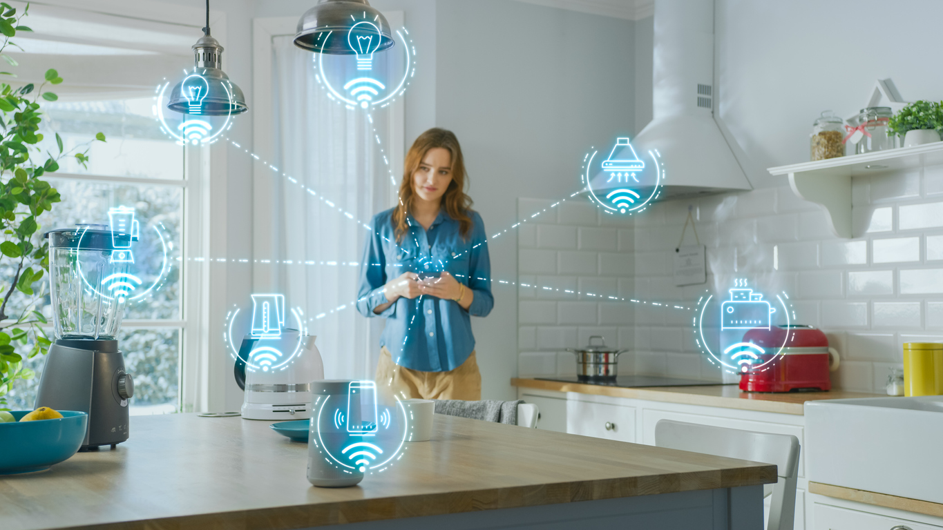 The 11 Biggest Mistakes You Can Make With Your Smart Home woman in kitchen surrounded by smart home devices