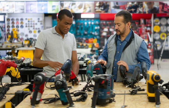 iStock-1323082730 home improvement tax holiday man buying tools in hardware store