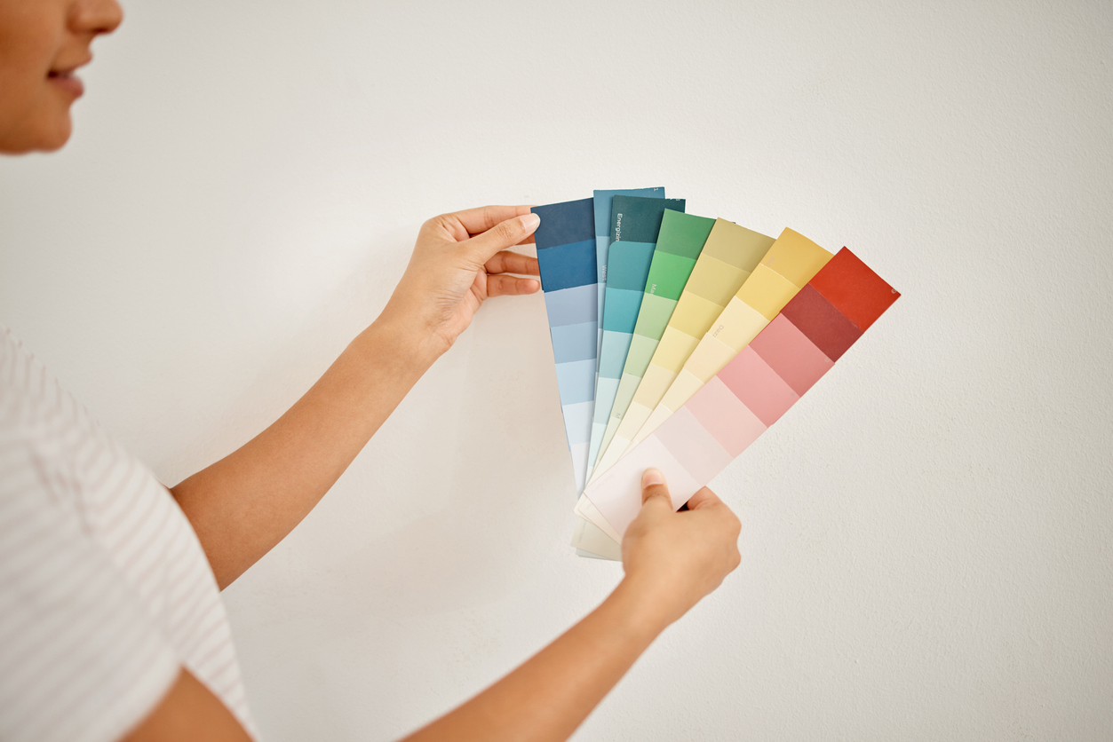 iStock-1385202077 Home Depot Shopping Cropped shot of an unrecognisable woman standing alone at home and holding colour swatches