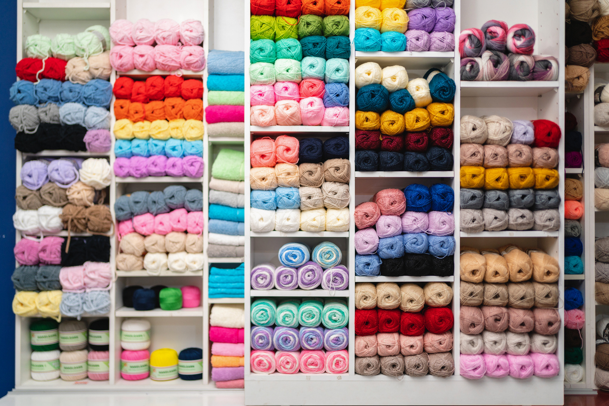 iStock-1388131549 decorate with yarn colorful yarn on shelves