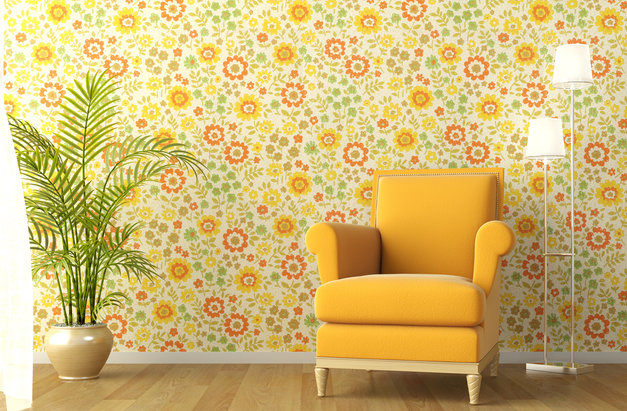 iStock-179056053 real estate agents dont want flowered wall paper in living room with big yellow chair