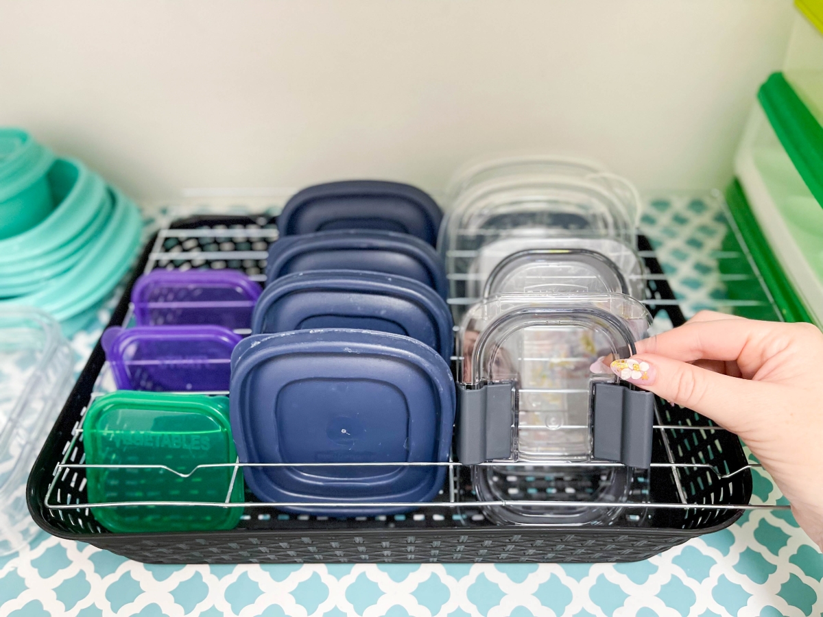 kitchen storage hacks - tupperware lid organizer