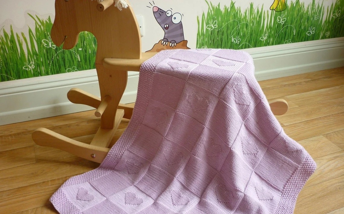 knitting patterns for beginners - pink knitted baby blanket