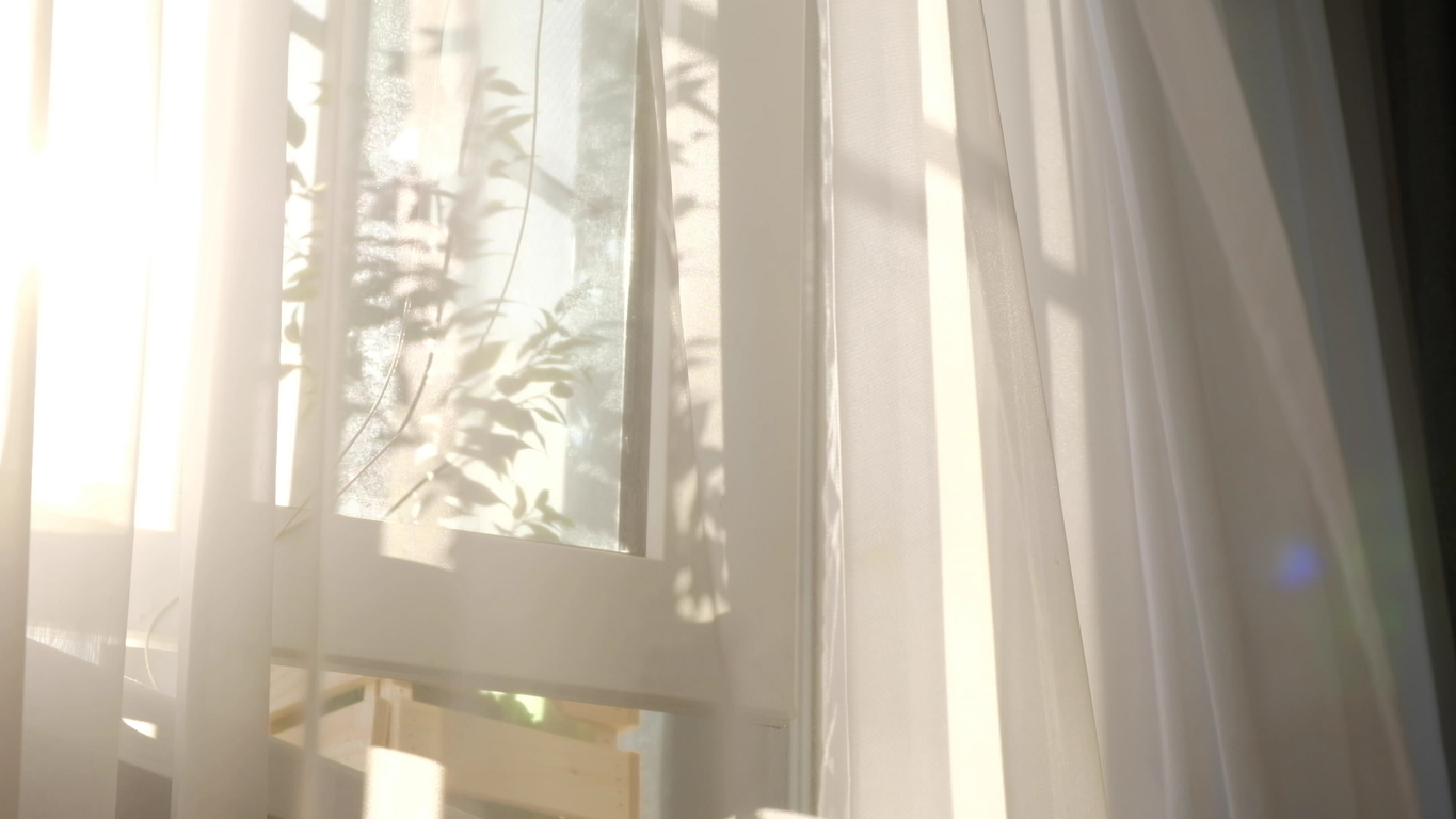 security window film sun shining through curtains window uv light