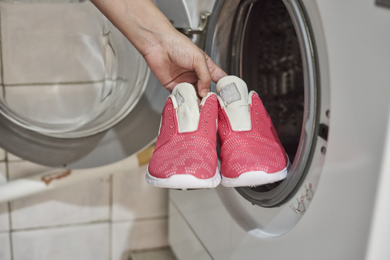 14 things you didn't know you can clean in your washing machine putting bright pink sneakers in machine