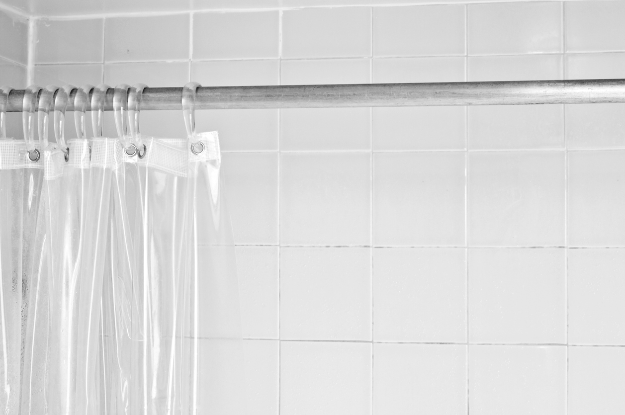 14 things you didn't know you can clean in your washing machine clear shower curtain liner in tiled bathroom