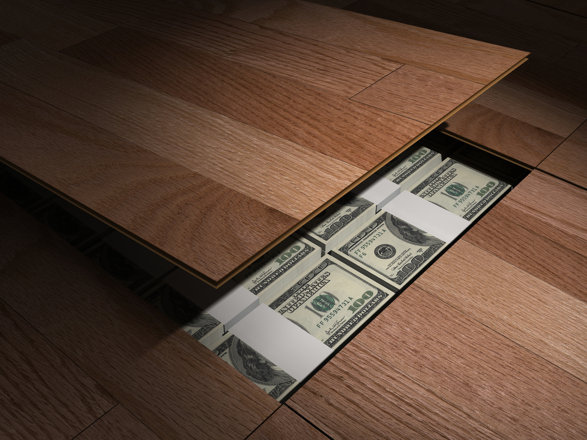 iStock-186845559 smart places to hide a safe money in the floor board