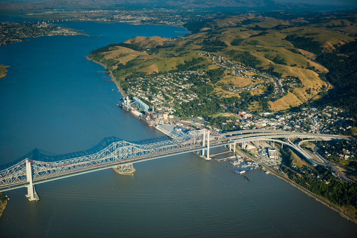 iStock-505875840 5 Places in the U.S. Where Homes Are Almost Uninsurable Because of Hurricanes and Flooding the Richmond-San Rafael Bridge, aerial view, California
