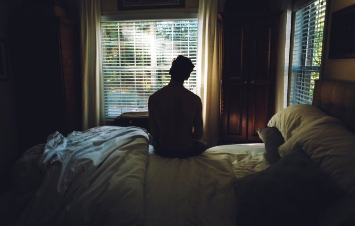 daylight savings time 2023 - man waking up facing sunlight