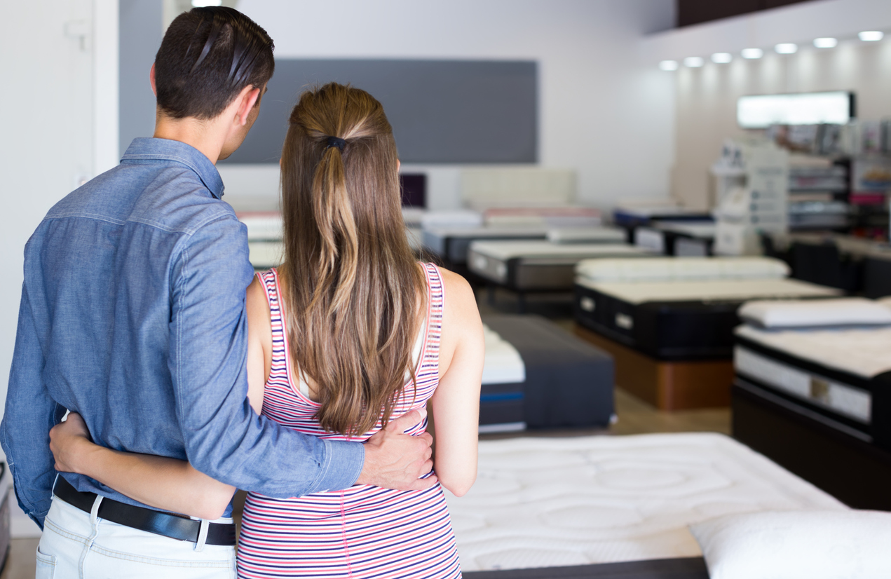 iStock-878938018 tax refunds home improvements ortrait of man and woman in mattress store