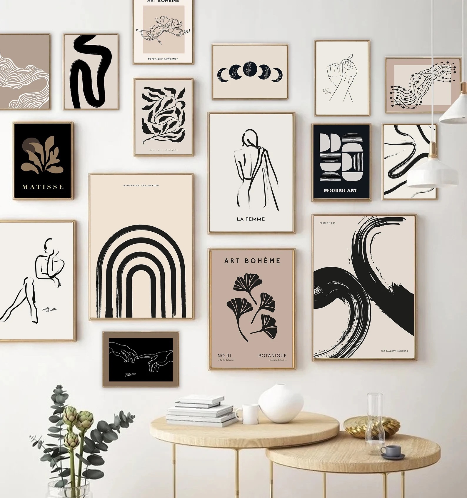 Etsy wall decor ideas gallery wall with black and white images in light wooden frams