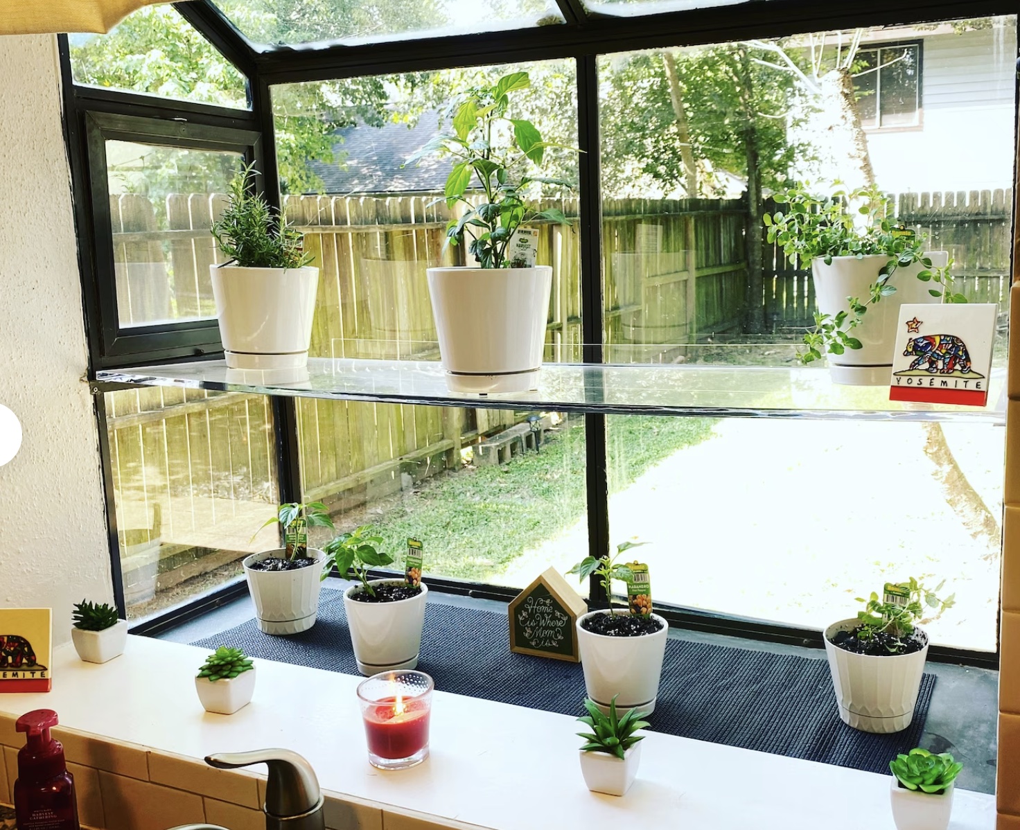 Etsy ways to dress up a window glass shelves in a kitchen window overlooking a backyard