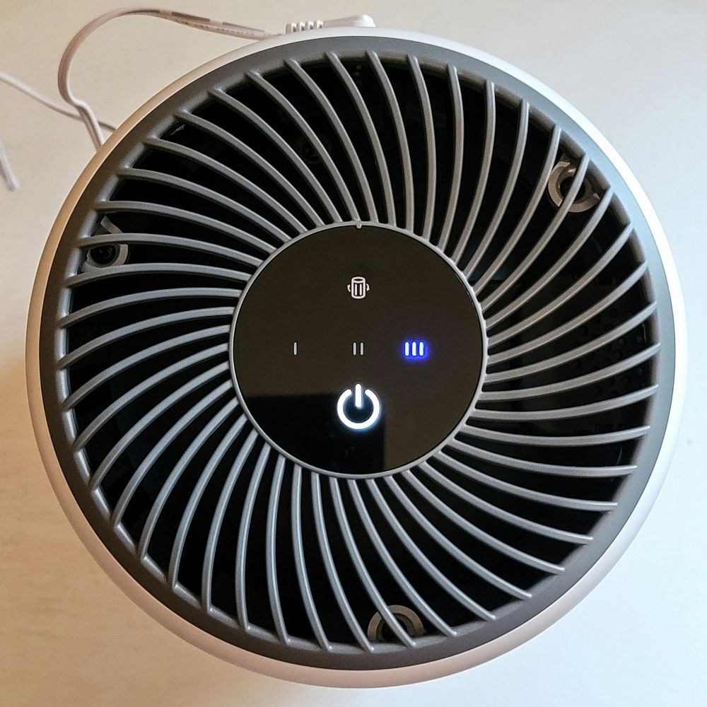 A photo from above the Levoit air purifier that shows its buttons and settings