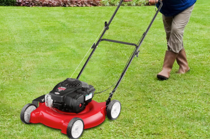 Best cheap lawn mower being used on grass