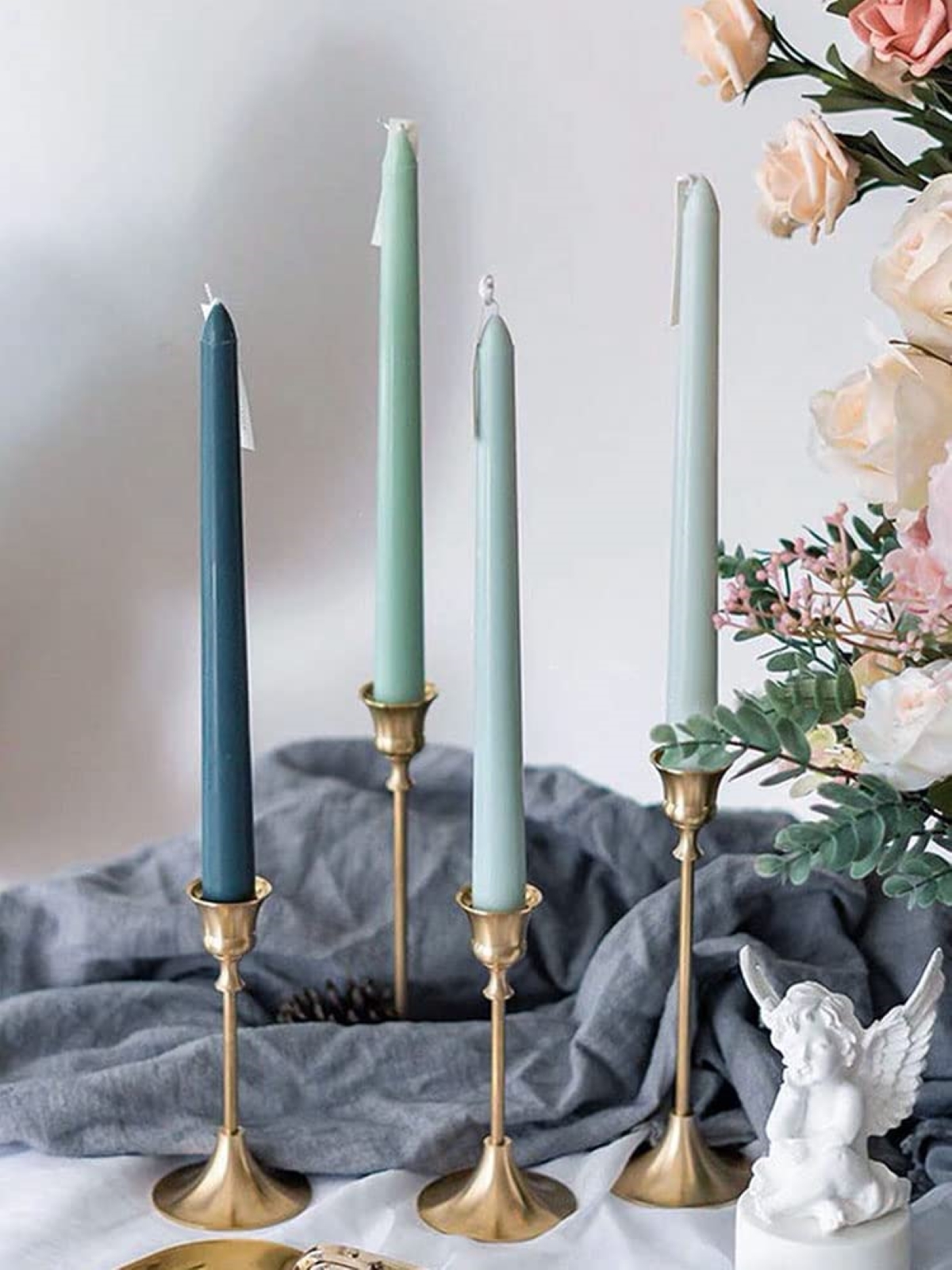 decor with candles - long tapered candles in gold inserts