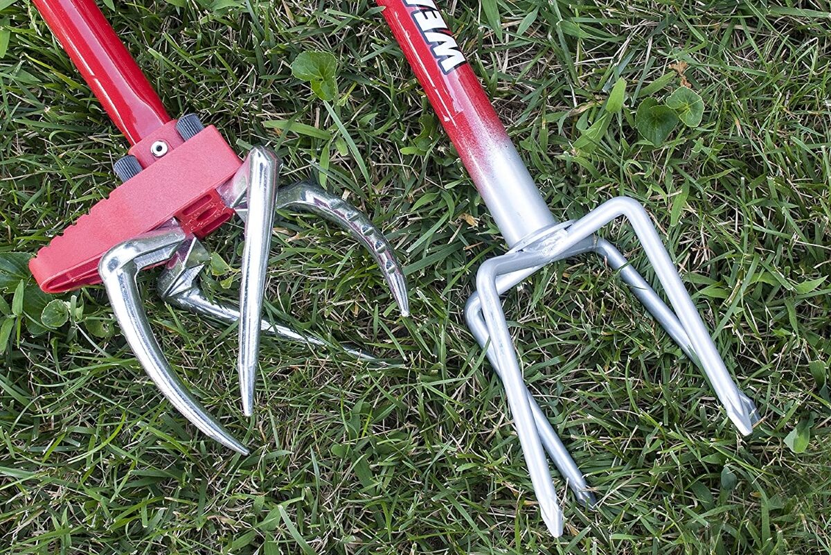 how to till a garden without a tiller - garden claw tools on green lawn