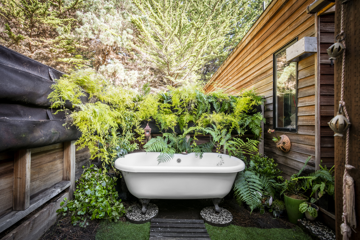 bathtub in backyard as diy landscaping