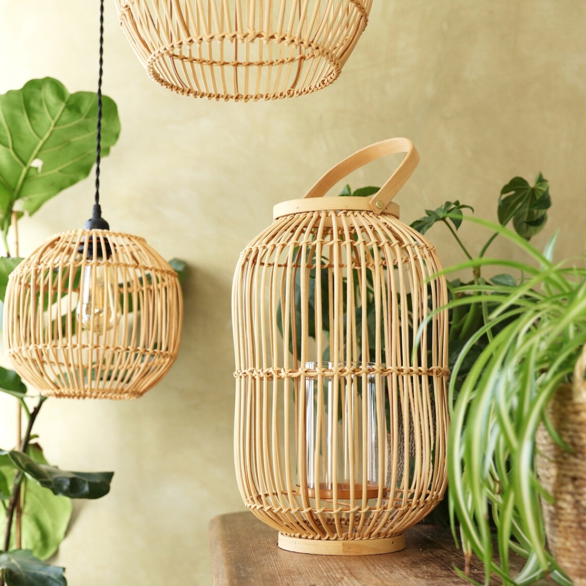 decor with candles - rattan lanterns with plants
