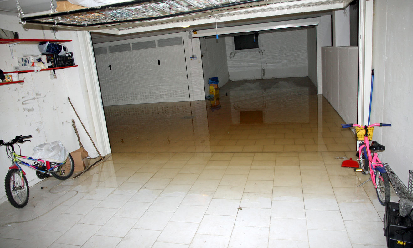 Basement flooded with water and belongings ruined