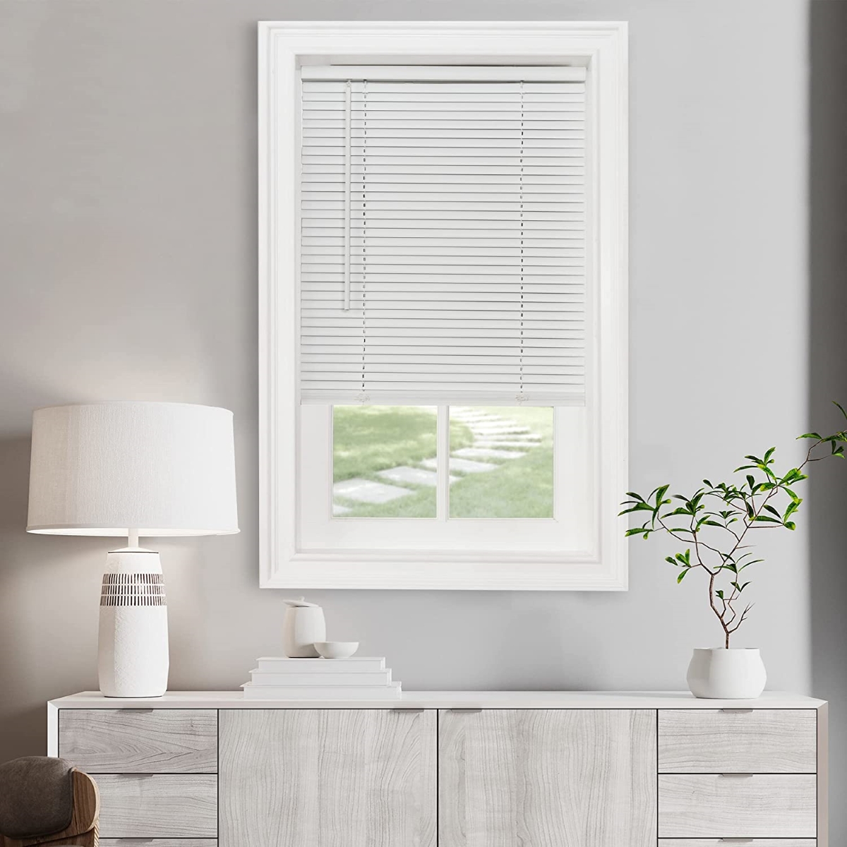 types of blinds - white blinds in window above cabinet