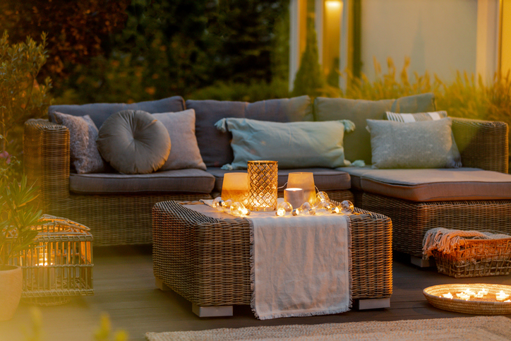 uplighting-landscape-cozy-patio-wicker-seating-area-with-soft-lighting