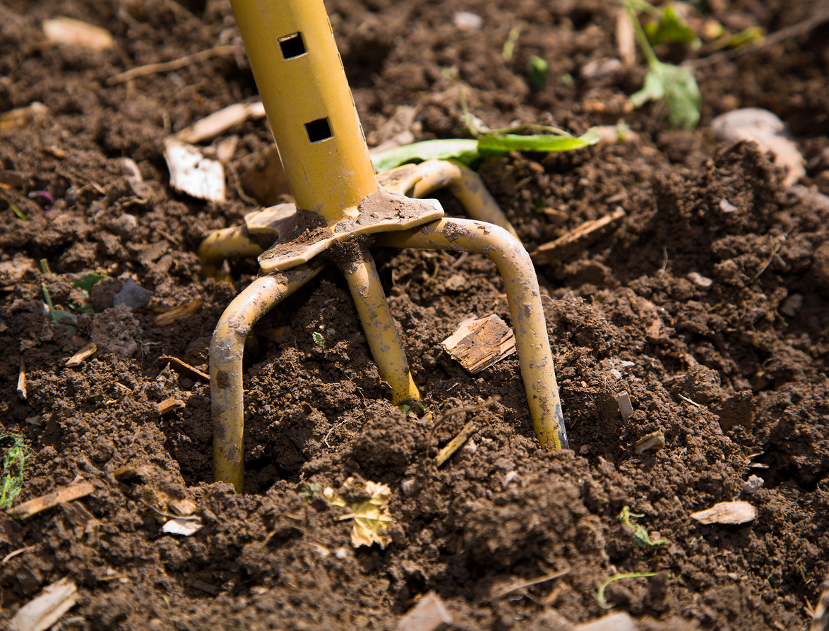 how to till a garden - using a garden claw hand tiller