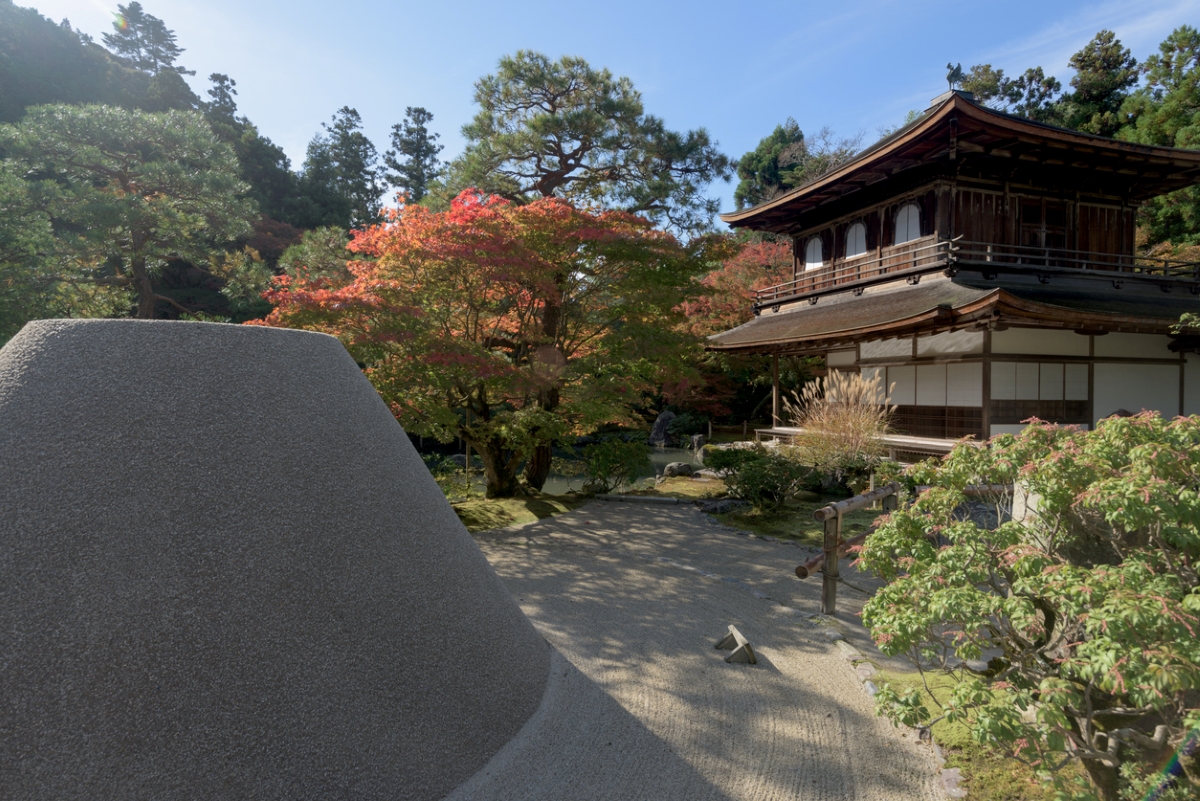 zen garden ideas - large rock near japanese temple