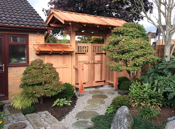 Wood Japanese niwamon garden gate with roof