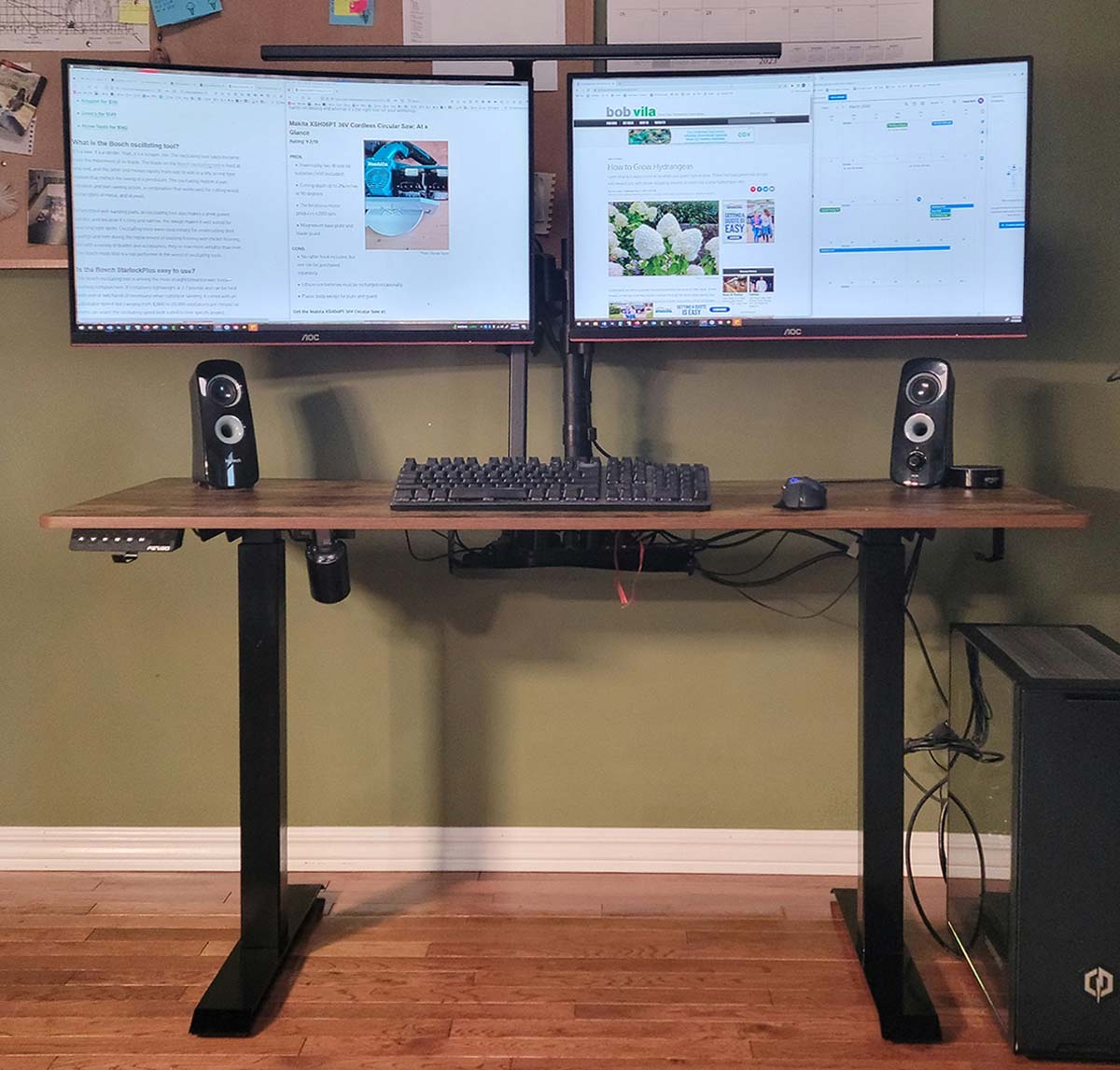 The Fezibo standing desk in its lowered position holding a dual-monitor computer setup
