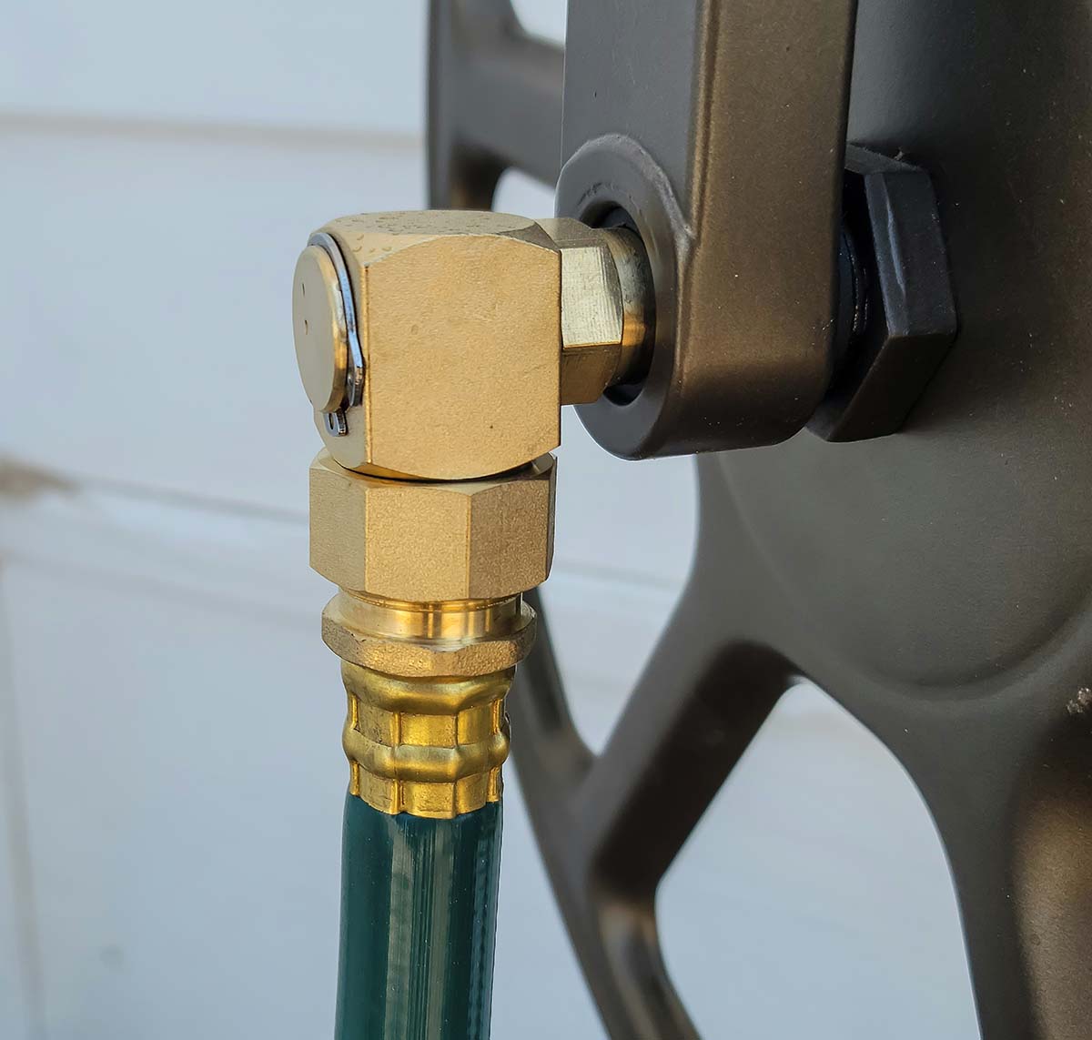 Brass hose connection on the Liberty hose reel