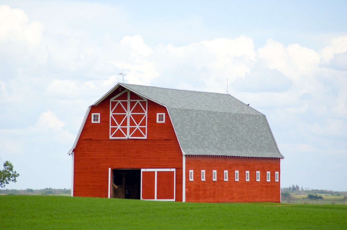 Two-story red barn with a gambrel roof