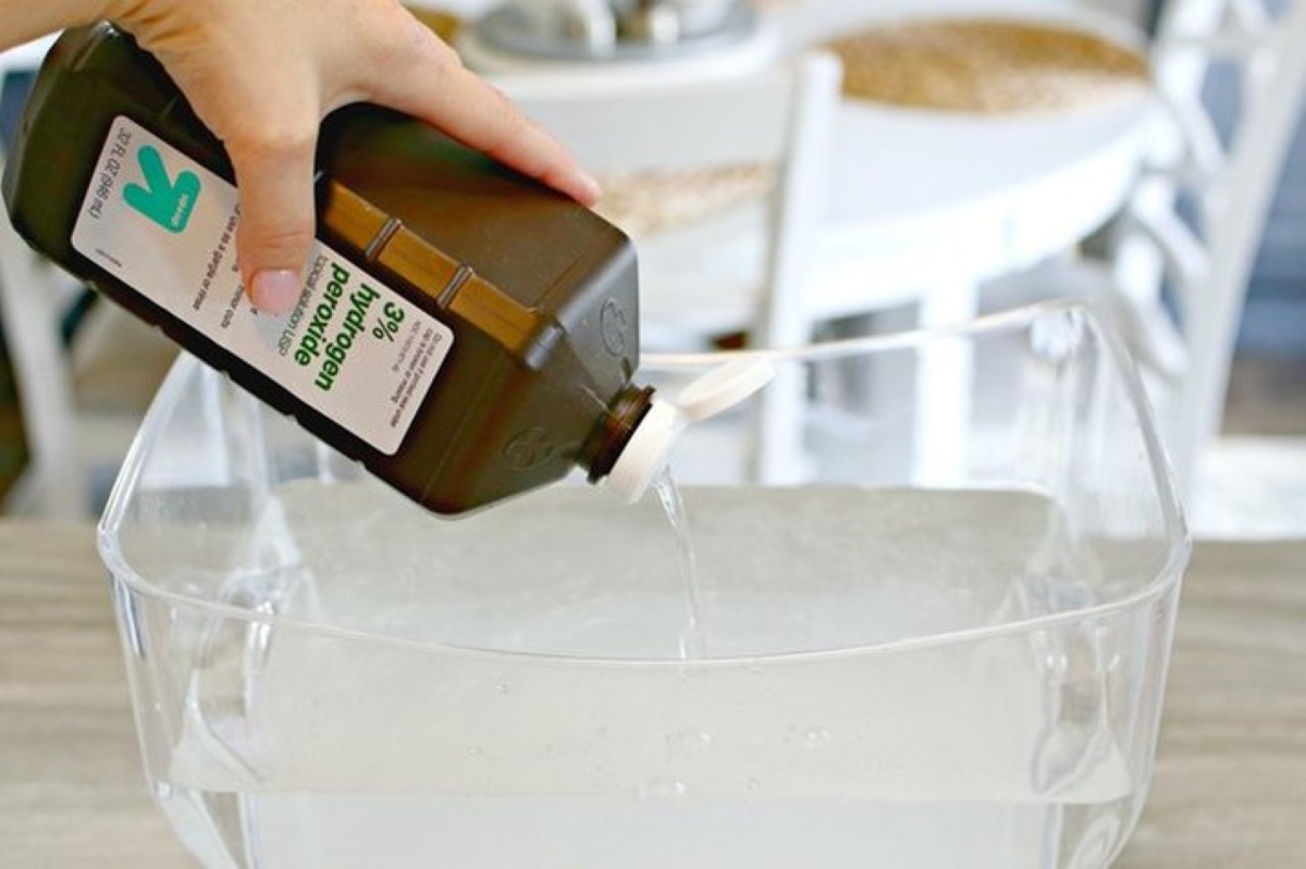 uses for hydrogen peroxide - pouring hydrogen peroxide in clear bowl