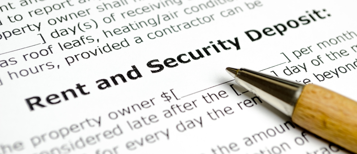 things to look for on your apartment lease - close up on rent and security deposit lease document