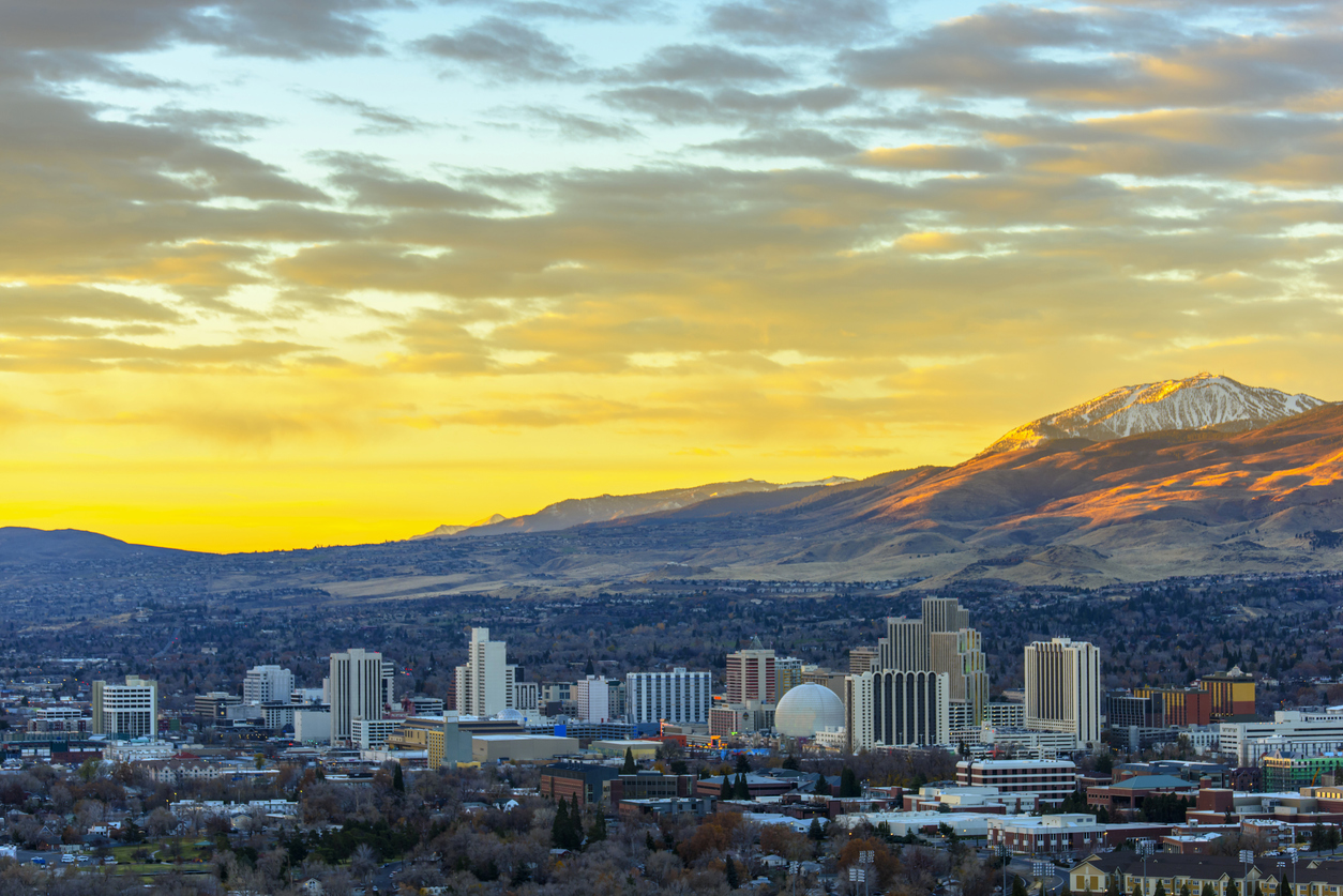 reno nevada aerial view skyscrapers sunset mountains