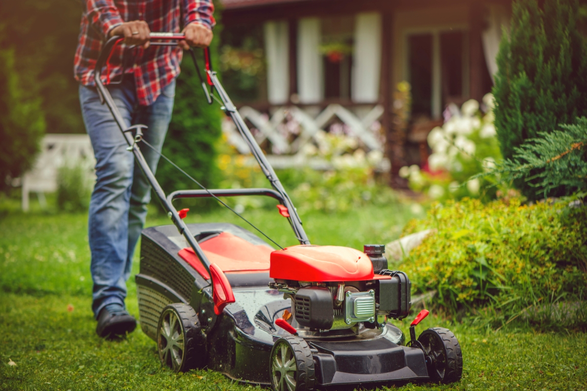 things to look for on your apartment lease - man mowing yard