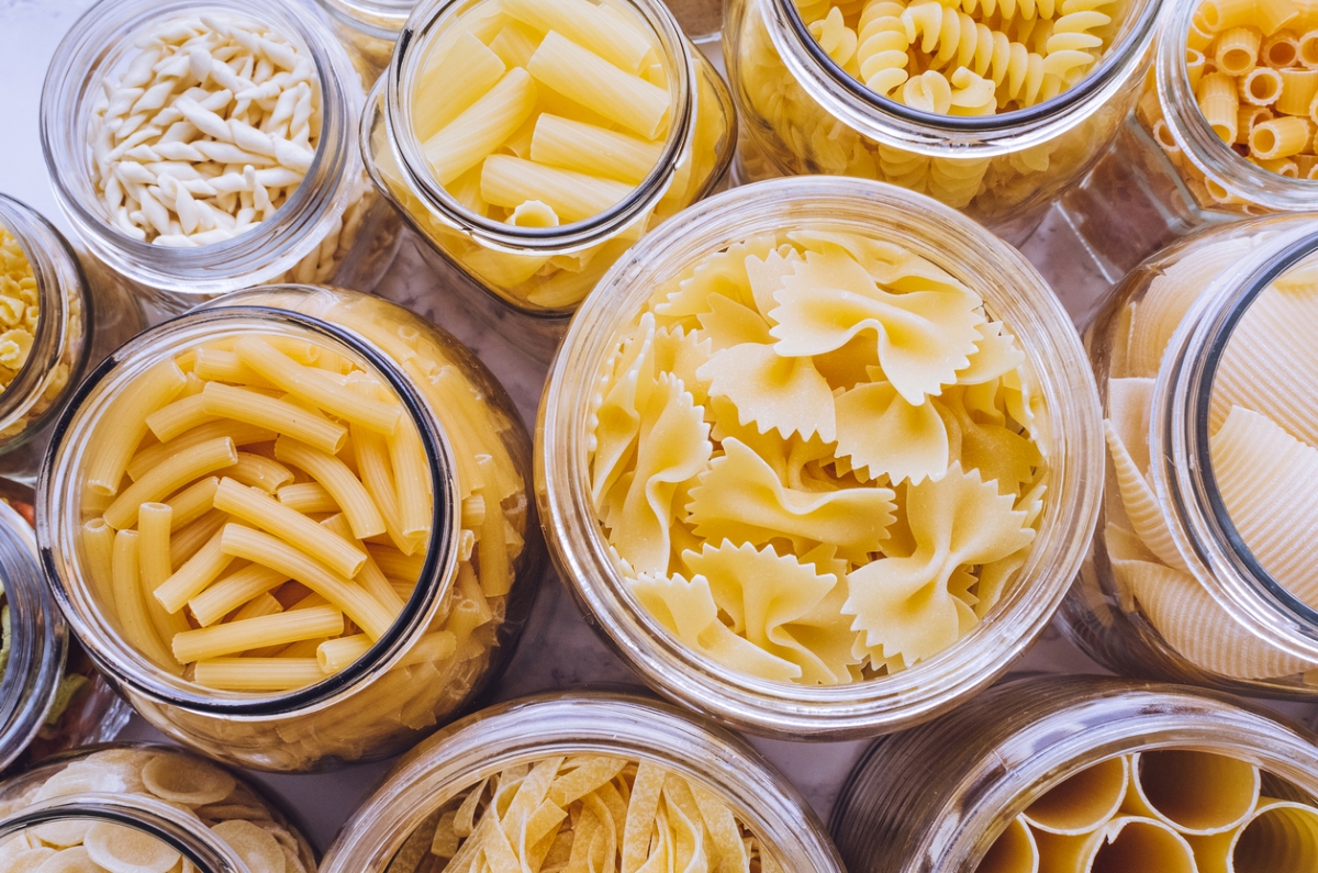foods that never expire - multiple open jars with various pasta types