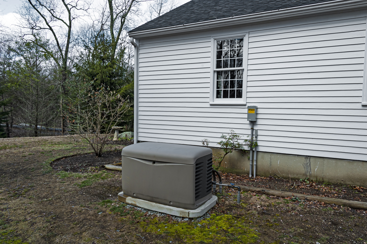 iStock-1271831454 standby generator electric generator on side of house