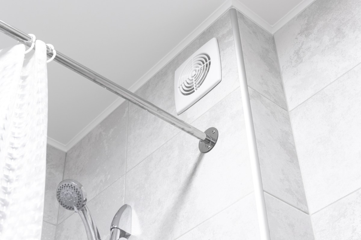 entilation fan near shower of gray and white bathroom