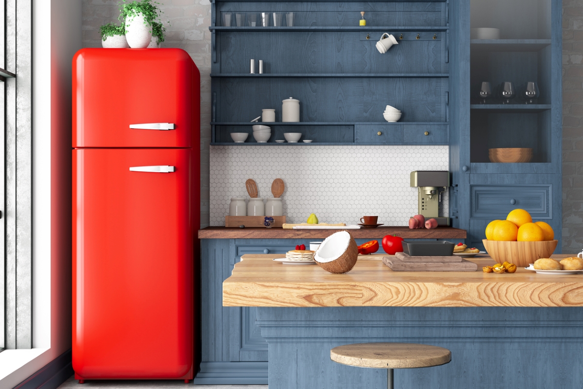 Blue kitchen with red vintage fridge
