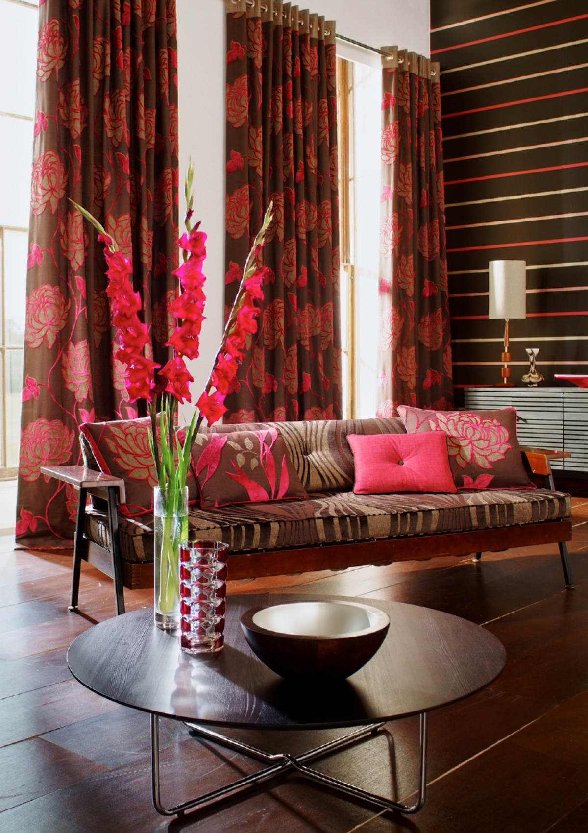 Contemporary living room with red floral curtains